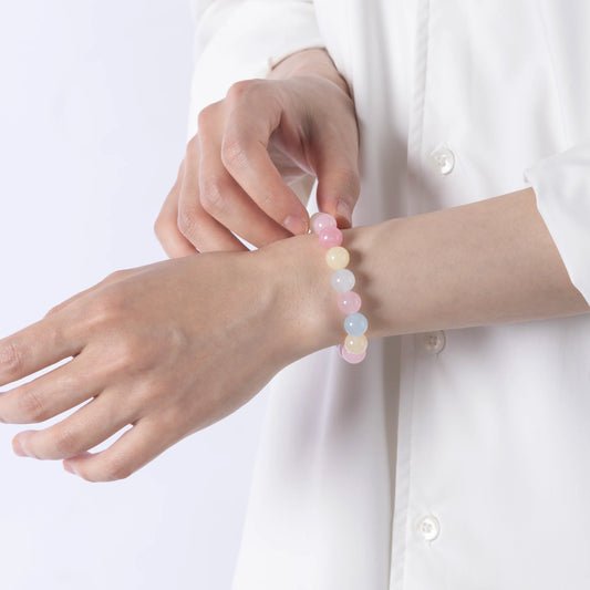 Tourmaline crystal bracelet featuring pink, yellow, and blue stones for emotional balance and joyful energy.