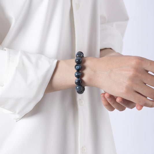 Blue Tiger Eye Bracelet for Strategic Focus and Emotional Balance — a sleek, dark-toned design that enhances clarity, mental resilience, and emotional grounding.