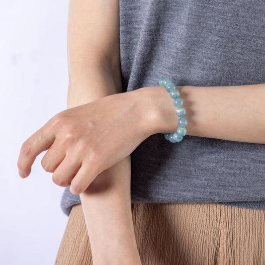 Blue Lace Agate Bracelet - A soothing gemstone bracelet designed to enhance emotional healing and balance, featuring light blue lace agate stones known for their calming properties.