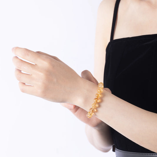 Model wearing Yellow Citrine Bracelet layered style