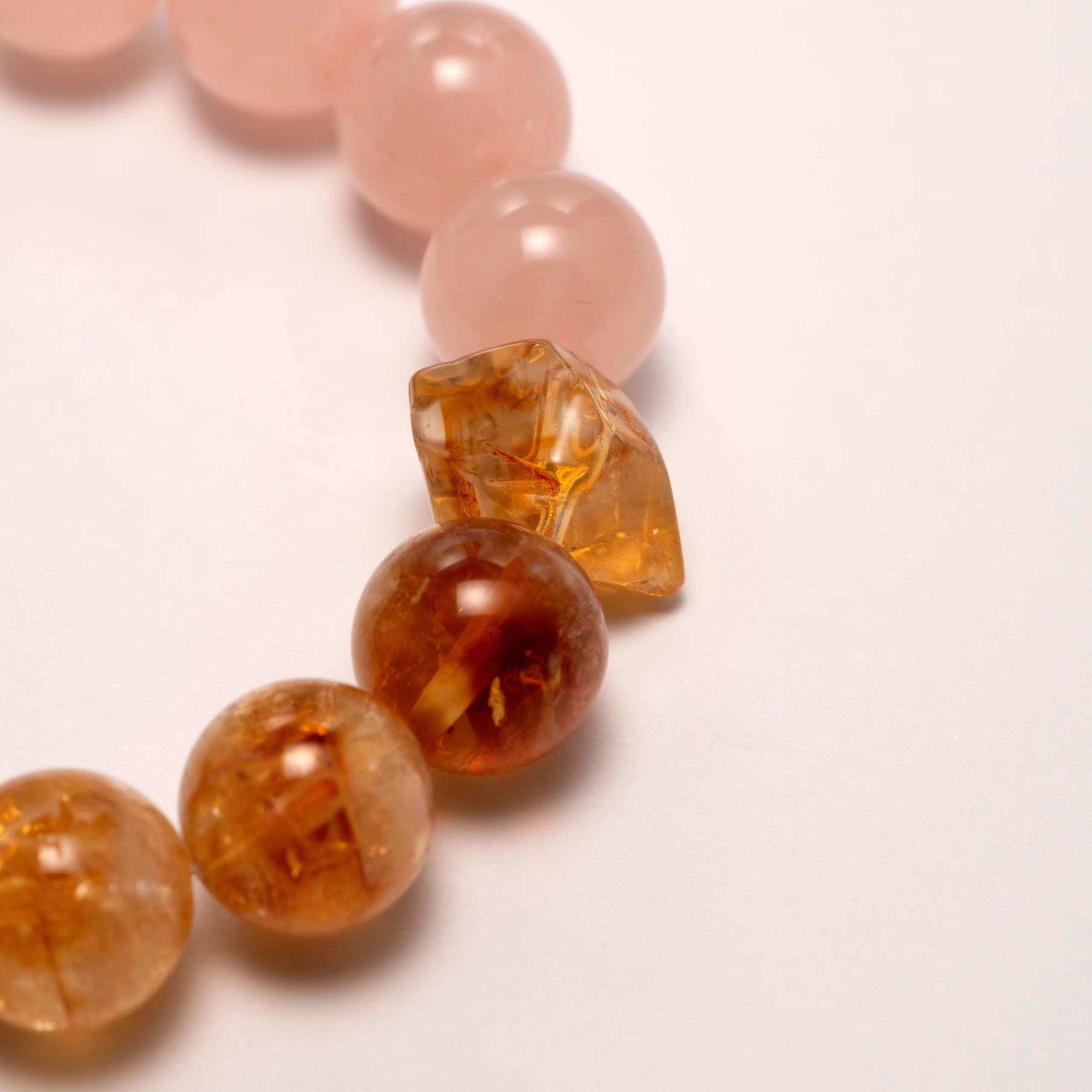 Rose Quartz & Citrine Crystal Bracelet – A beautiful bracelet made with Rose Quartz crystals and Citrine Crystals , known for their healing properties and ability to promote love, peace, and emotional healing.