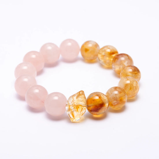Rose Quartz & Citrine Crystal Bracelet – A beautiful bracelet made with Rose Quartz crystals and Citrine Crystals , known for their healing properties and ability to promote love, peace, and emotional healing.