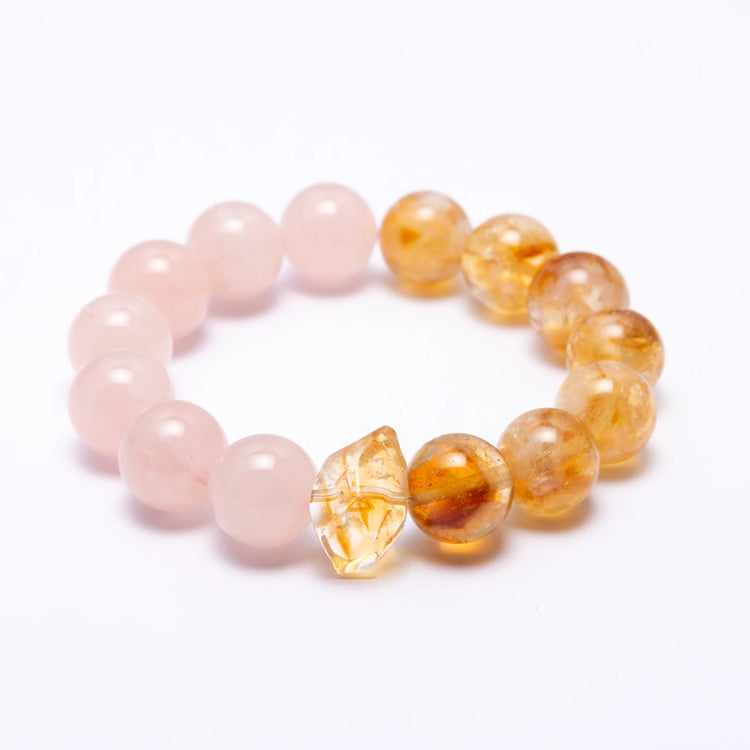 Rose Quartz & Citrine Crystal Bracelet – A beautiful bracelet made with Rose Quartz crystals and Citrine Crystals , known for their healing properties and ability to promote love, peace, and emotional healing.
