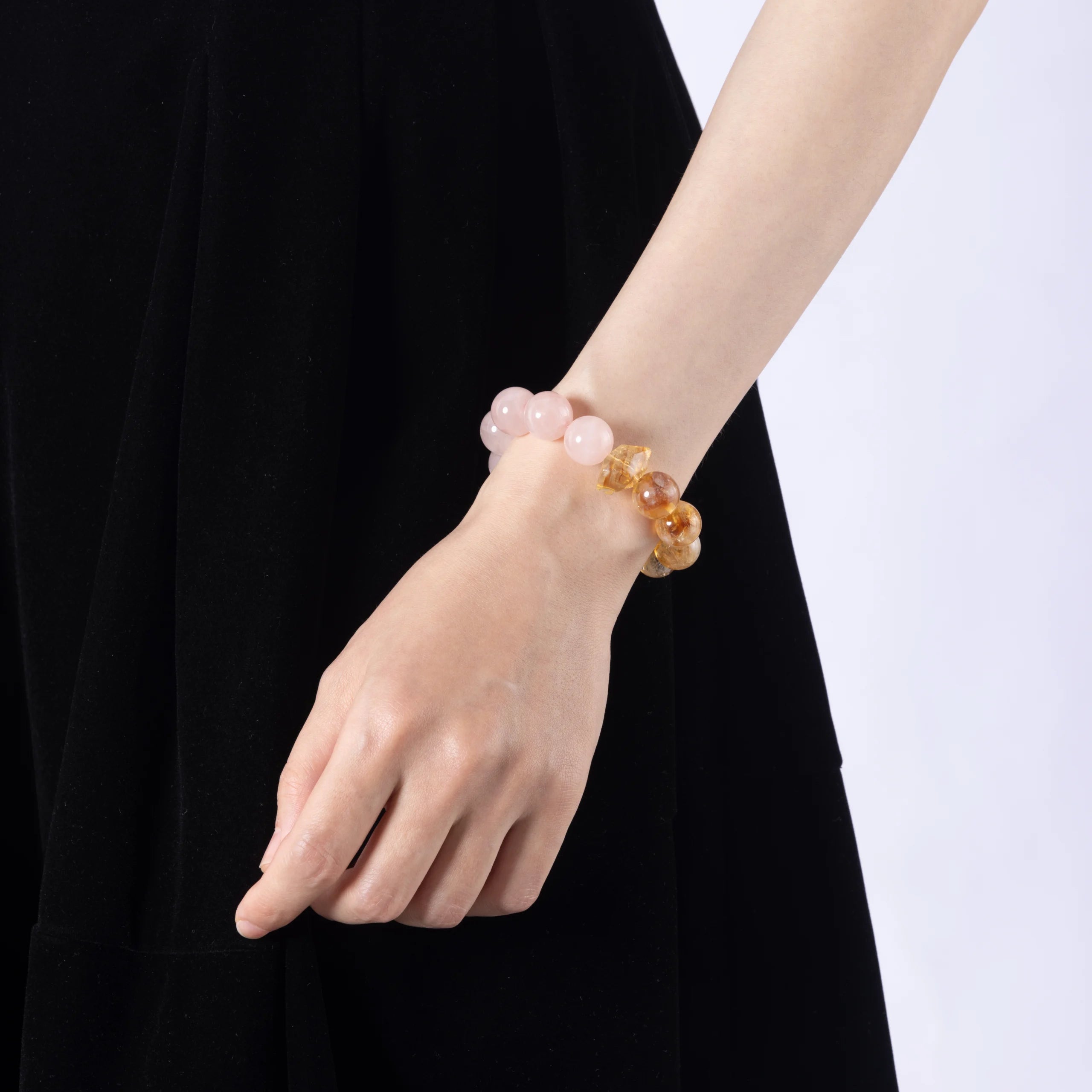 Rose Quartz & Citrine Crystal Bracelet – A beautiful bracelet made with Rose Quartz crystals and Citrine Crystals , known for their healing properties and ability to promote love, peace, and emotional healing.