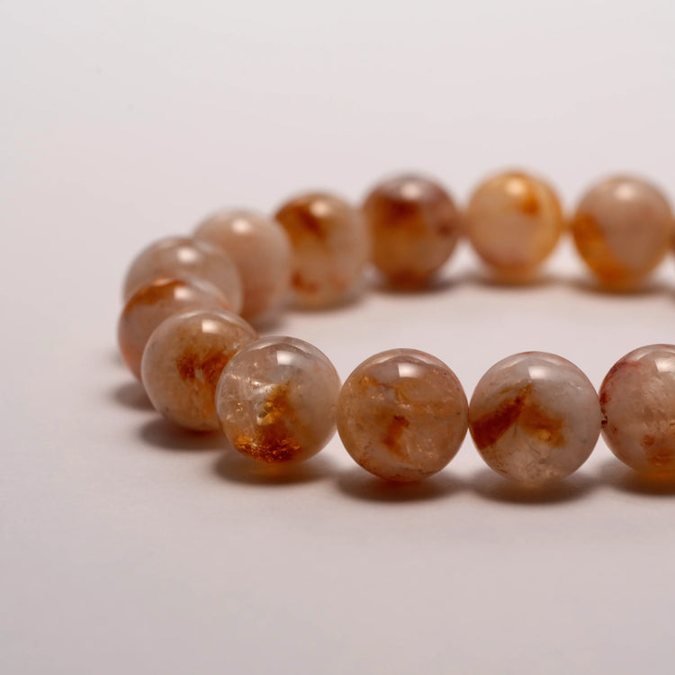 Natural Gold Rutilated Quartz Bracelet – A stunning collection of handcrafted jewelry made with natural crystals, known for their healing properties and unique beauty.