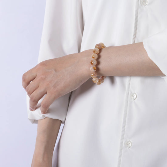 Natural Gold Rutilated Quartz Bracelet – A stunning collection of handcrafted jewelry made with natural crystals, known for their healing properties and unique beauty.