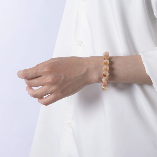 Natural Gold Rutilated Quartz Bracelet – A stunning collection of handcrafted jewelry made with natural crystals, known for their healing properties and unique beauty.