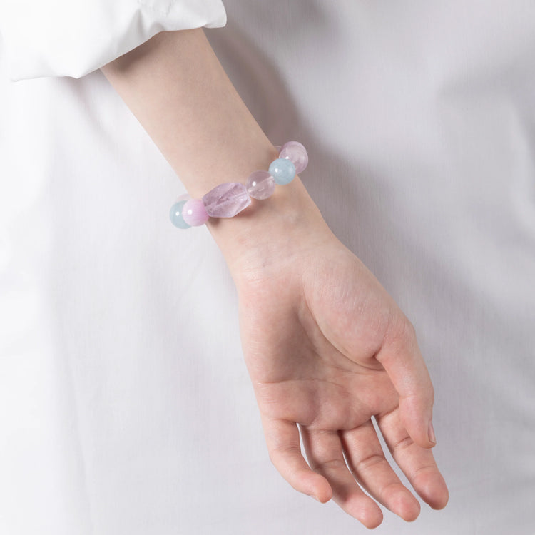 Lepidolite Crystal & Purple Rutilated Quartz Bracelet featuring Lepidolite, Aquamarine, Purple Rutilated Quartz, and faceted Lavender Amethyst for emotional clarity and inner peace