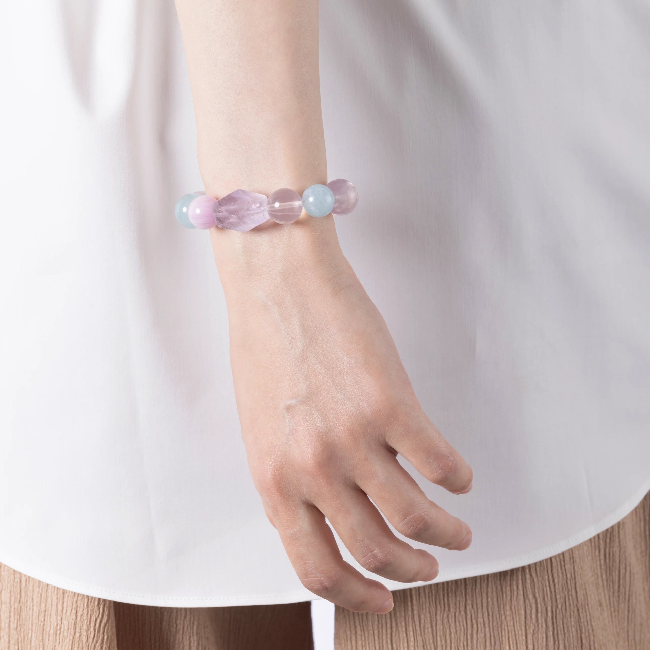 Lepidolite Crystal & Purple Rutilated Quartz Bracelet featuring Lepidolite, Aquamarine, Purple Rutilated Quartz, and faceted Lavender Amethyst for emotional clarity and inner peace