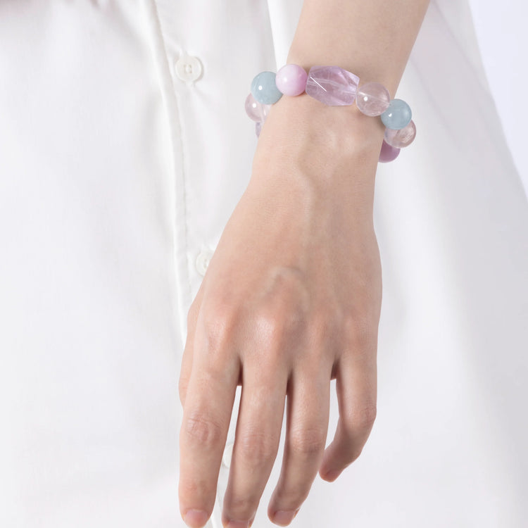 Lepidolite Crystal & Purple Rutilated Quartz Bracelet featuring Lepidolite, Aquamarine, Purple Rutilated Quartz, and faceted Lavender Amethyst for emotional clarity and inner peace