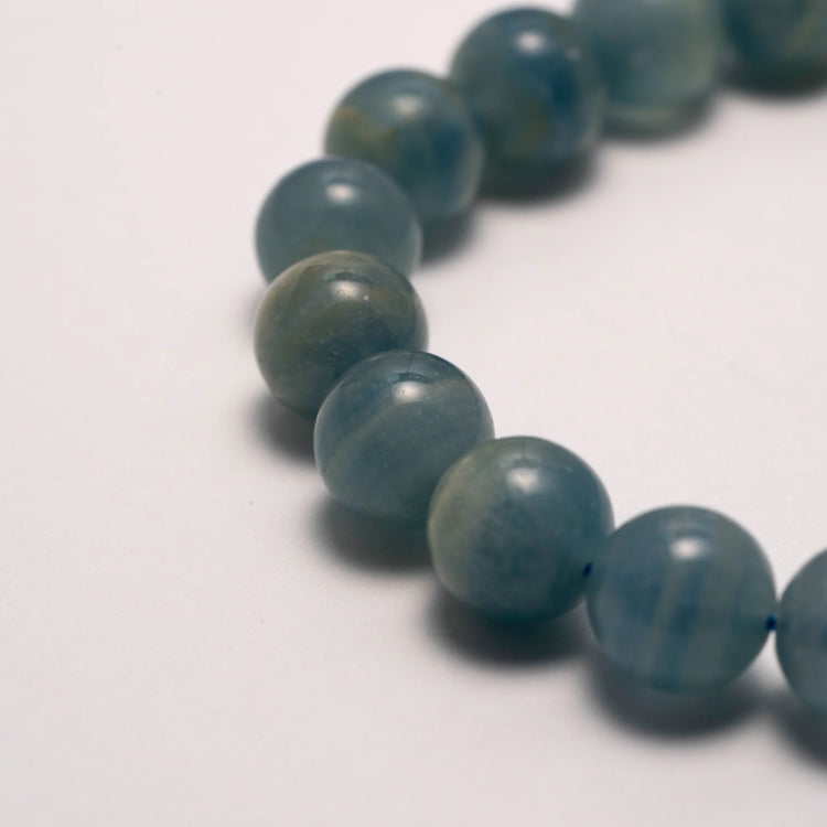 Blue Lace Agate Bracelet - A soothing gemstone bracelet designed to enhance emotional healing and balance, featuring light blue lace agate stones known for their calming properties.