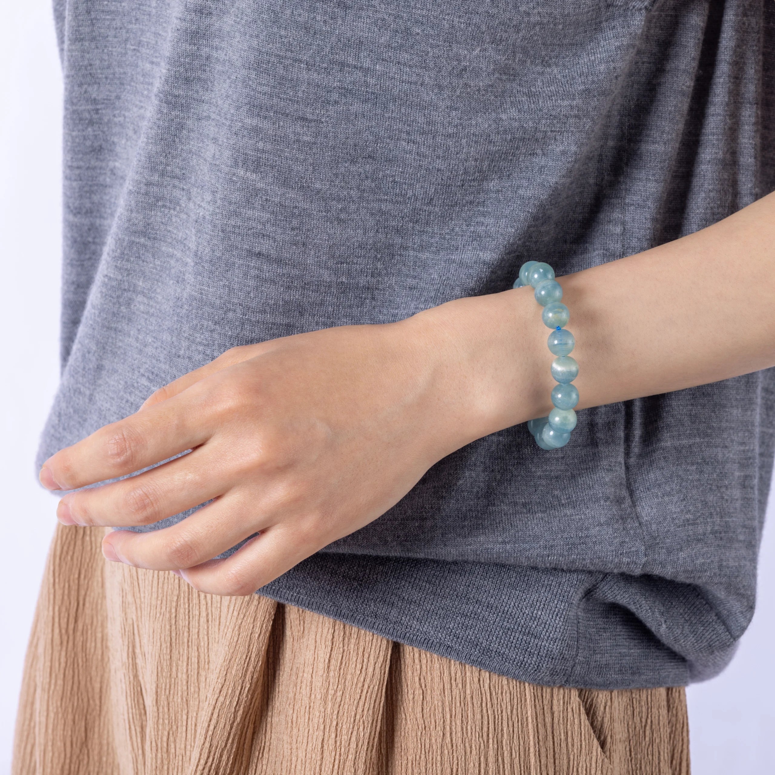 Blue Lace Agate Bracelet - A soothing gemstone bracelet designed to enhance emotional healing and balance, featuring light blue lace agate stones known for their calming properties.