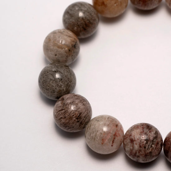 Healing Crystal Bracelet – A beautifully designed bracelet made with various healing crystals, known for their ability to restore balance, promote energy, and support emotional healing.