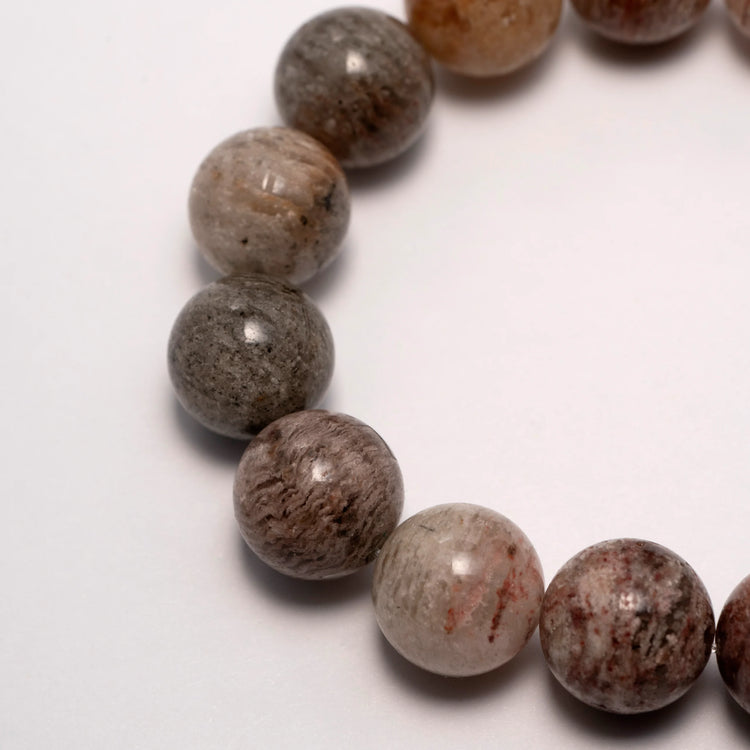 Healing Crystal Bracelet – A beautifully designed bracelet made with various healing crystals, known for their ability to restore balance, promote energy, and support emotional healing.