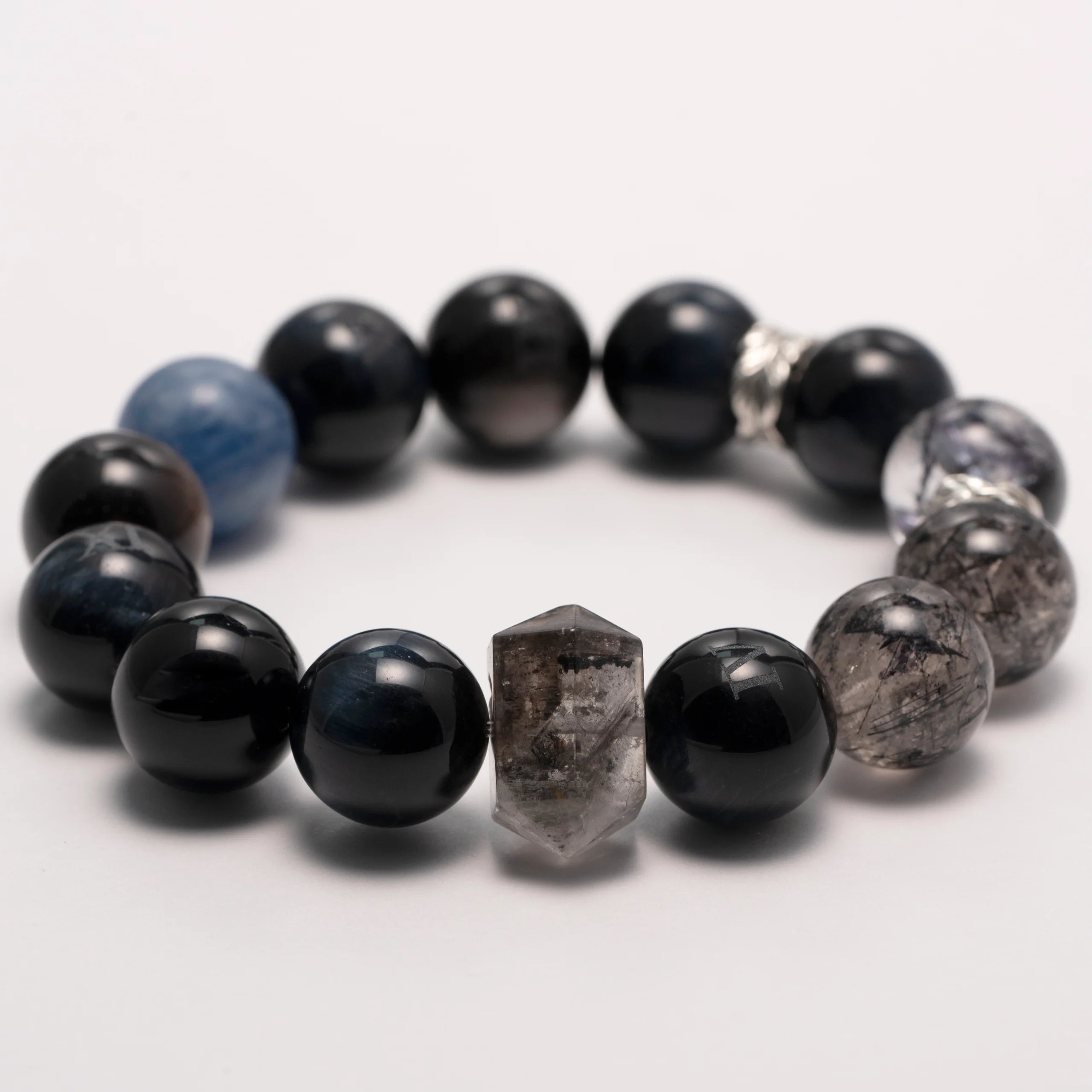 Obsidian crystal bracelet with Obsidian, Smoky Quartz, and Blue Tiger Eye beads – Midnight Guard design for strength and protection.
