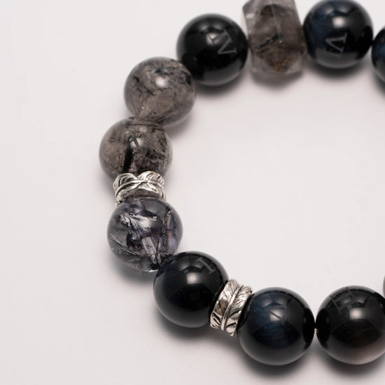 Obsidian crystal bracelet with Obsidian, Smoky Quartz, and Blue Tiger Eye beads – Midnight Guard design for strength and protection.