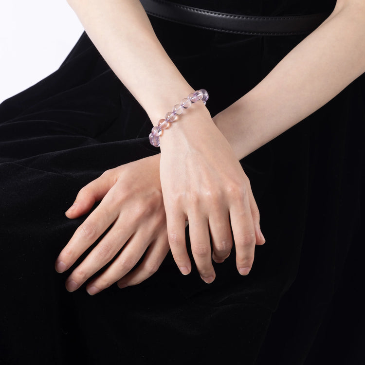 Woman wearing Amethyst Crystal Bracelet on wrist
