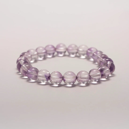 Amethyst Crystal Bracelet displayed flat on surface