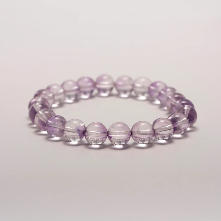 Amethyst Crystal Bracelet displayed flat on surface