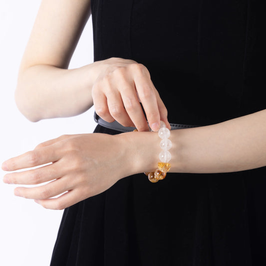 A Citrine Crystal & Clear Quartz Bracelet – A radiant bracelet made with citrine crystals, known for their ability to attract abundance, promote positivity, and enhance energy.